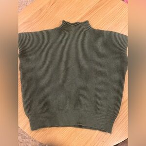 Green sleeveless mockneck with shoulder pads